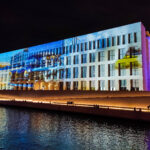 Building of Humboldt Forum museum illuminated with 3d mapping during 2024 Festival of Lights in Berlin, Germany